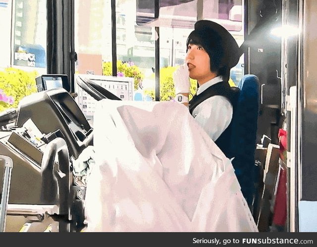 A white blanket over the fare machine. While on strike, bus drivers in Okayama, Japan,