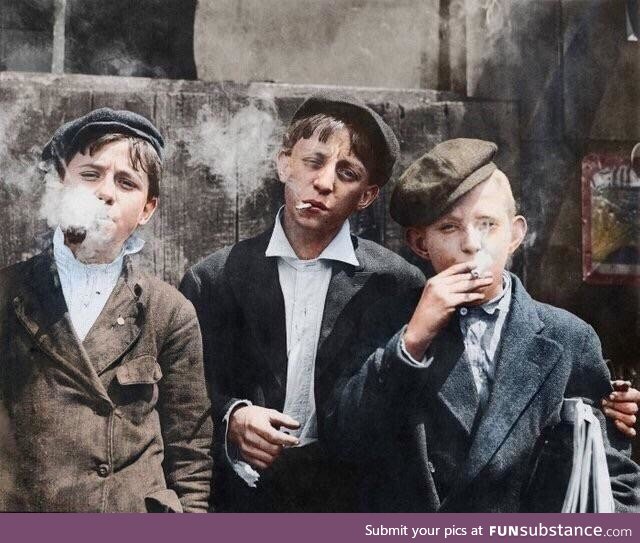 Paperboys on smoke break, circa 1910