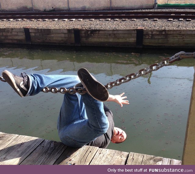 Don't have a friend take a picture of me while sitting on an unstable chain link fence