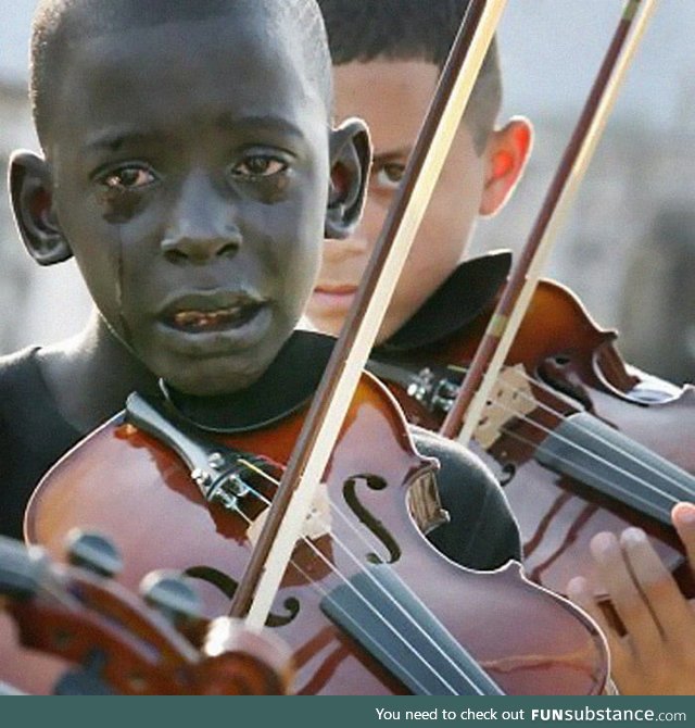 Diego Fraz&atilde;O Torquato, 12 year old Brazilian playing the violin at his