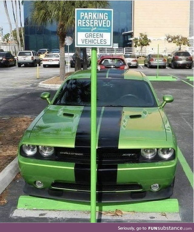 Green vehicle parking only