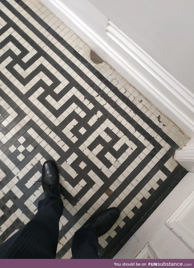 This pattern on the floor gets cut off because of the corner piece