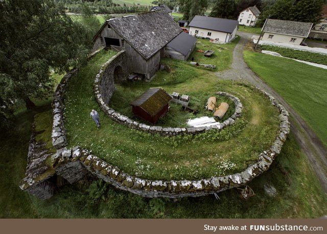 A stone ramp used to load material to the second floor of a barn