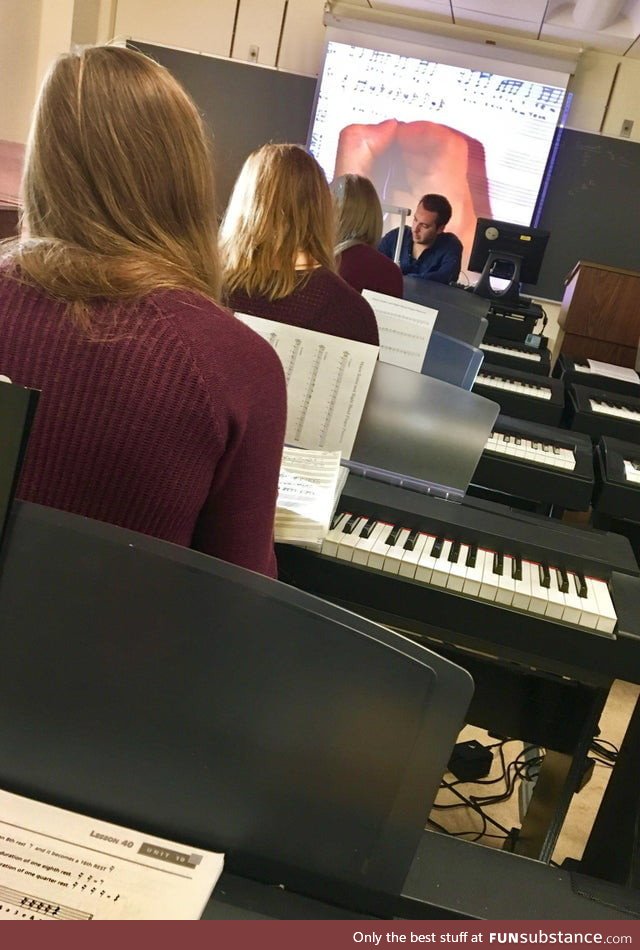 Three girls in the same row, wearing the same color sweater, with the same color hair