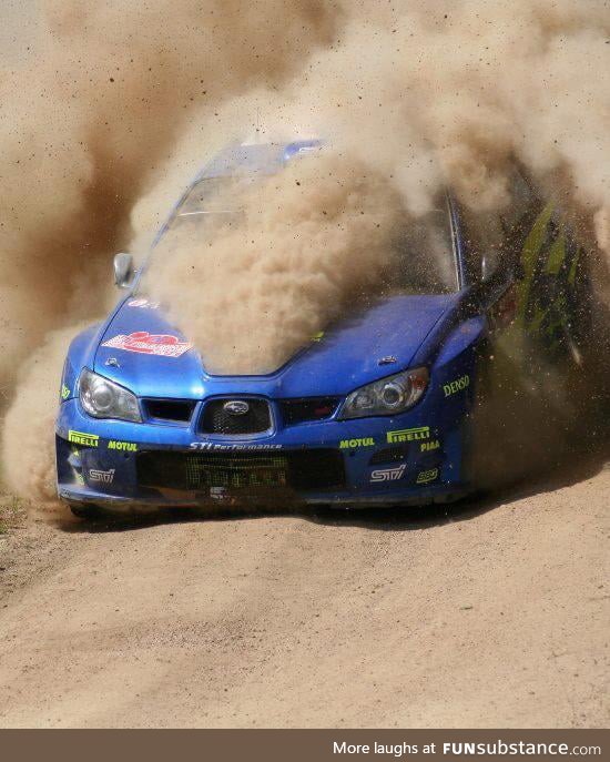 This shot of a WRC Subaru Impreza rally car