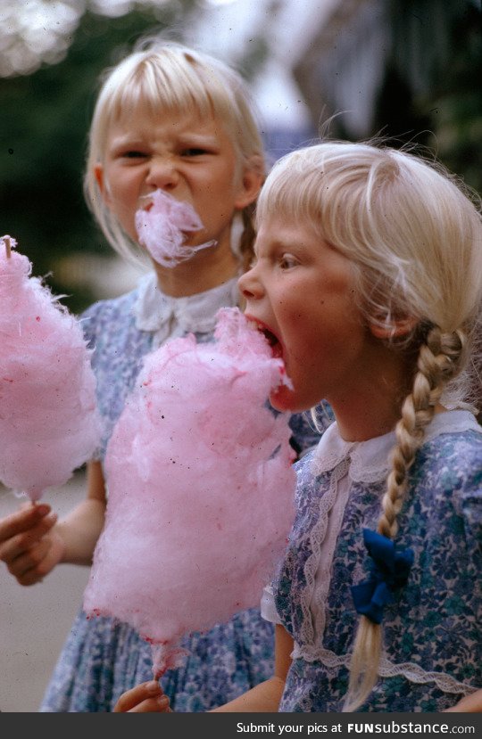 Girls eat cotton candy in Denmark, 1963