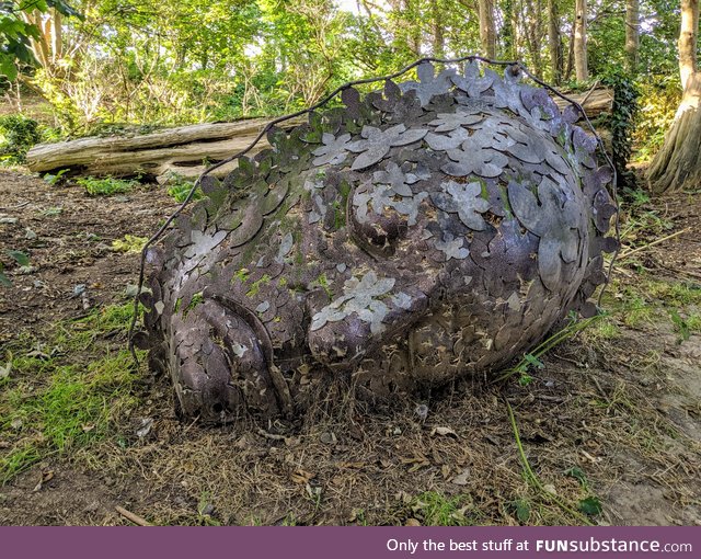 A metal sculpture found in the local woods