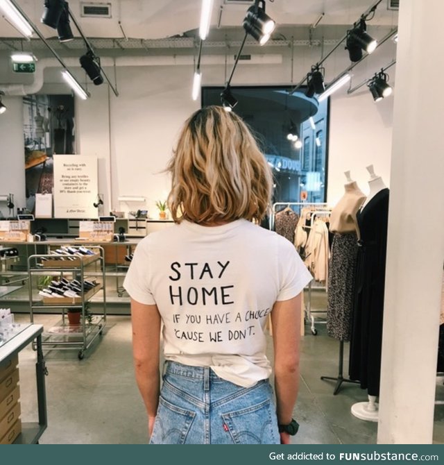 Belgian employee of & Other Stories, part of H&M, protesting the fact that she has to