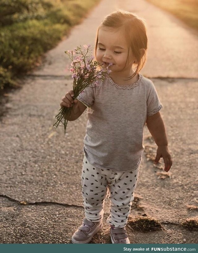 Meet Mayla, she loves smelling flowers. I‘m one proud godfather