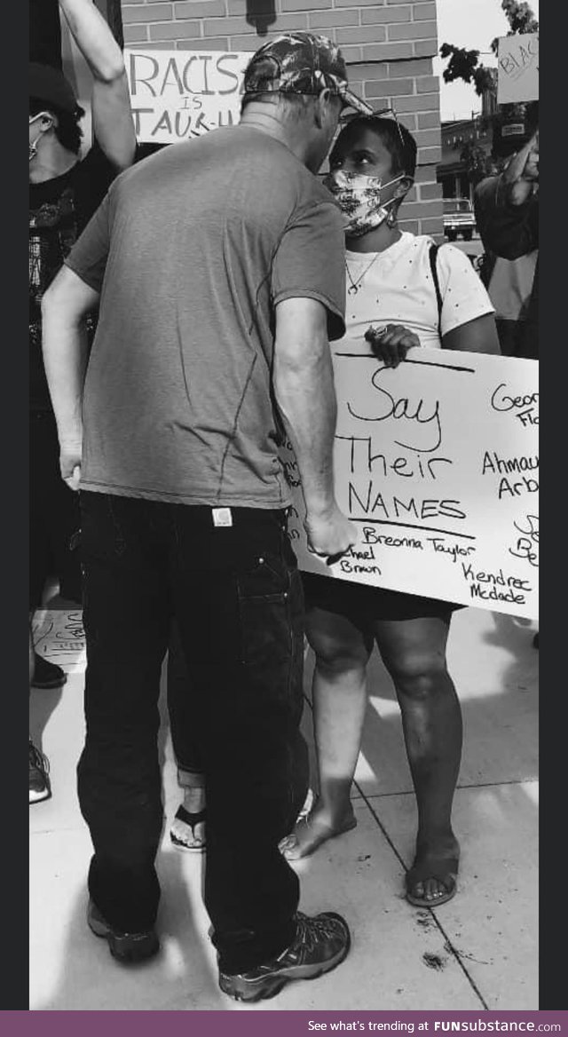 Woman stands strong in the face of hate during a BLM protest