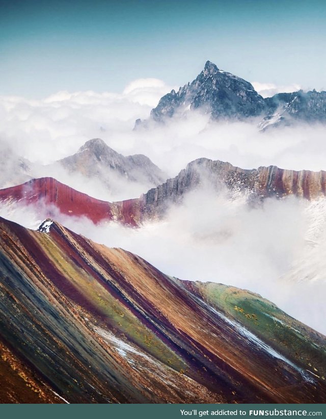 Clouds over Rainbow Mountain in Peru