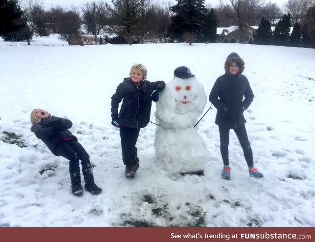 A picture was taken right as my little sis got nailed with a snowball by my dad merry