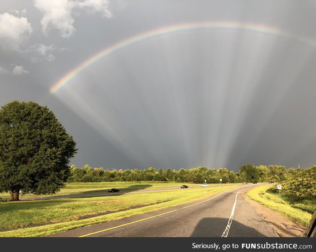 Interesting rainbow with sun rays