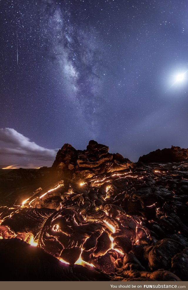 A meteor, the milky way, the moon and the lava flow together!