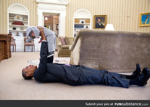 President Barack Obama and Ella Rhodes in the Oval Office, 10/30/15 at the WH Halloween