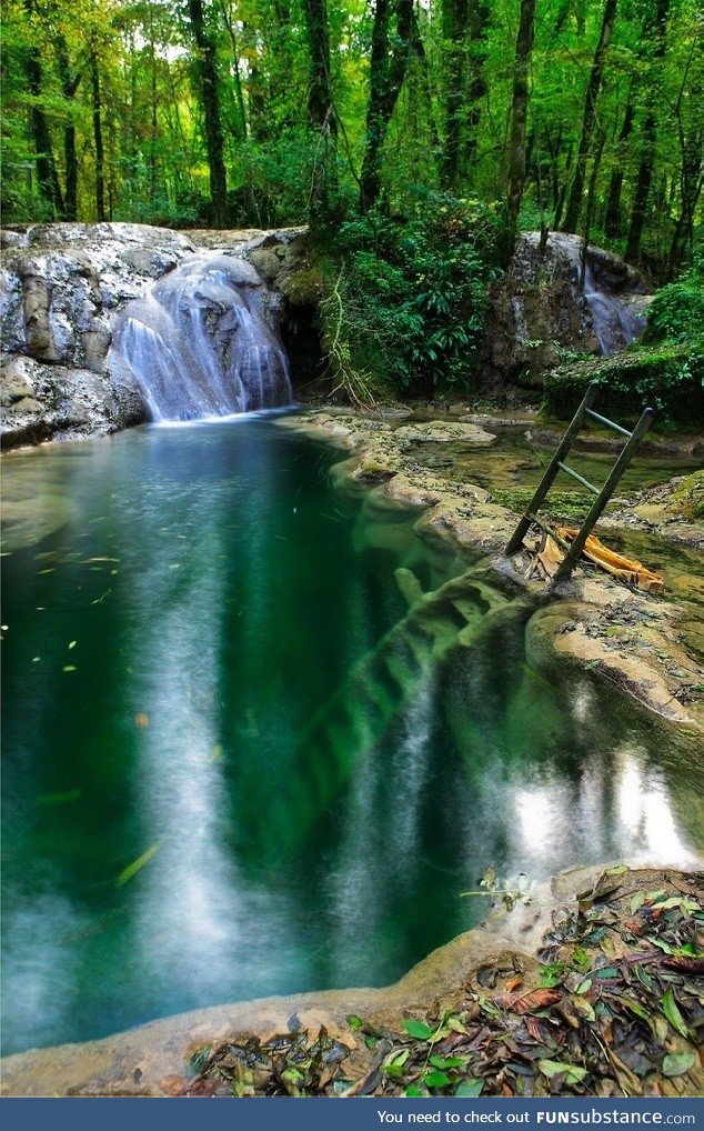 Deep ladder in a waterfall