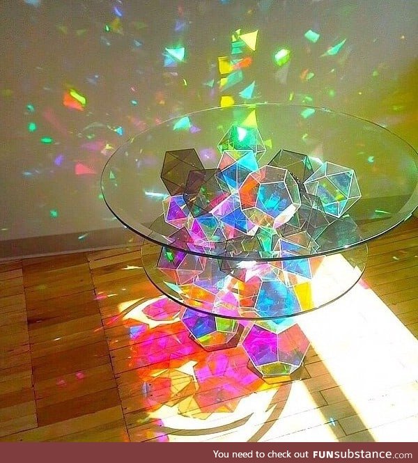 A beautiful glass table crafted by John Foster, I'm mesmerized