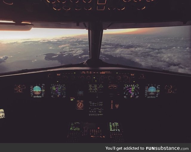 The c*ckpit of an Airbus 320 cruising over San Juan, Puerto Rico at 36,000 feet