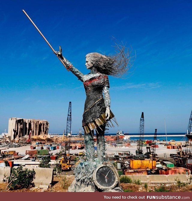 The Beirut lady statue , made of some of the debris of the explosion happened that back