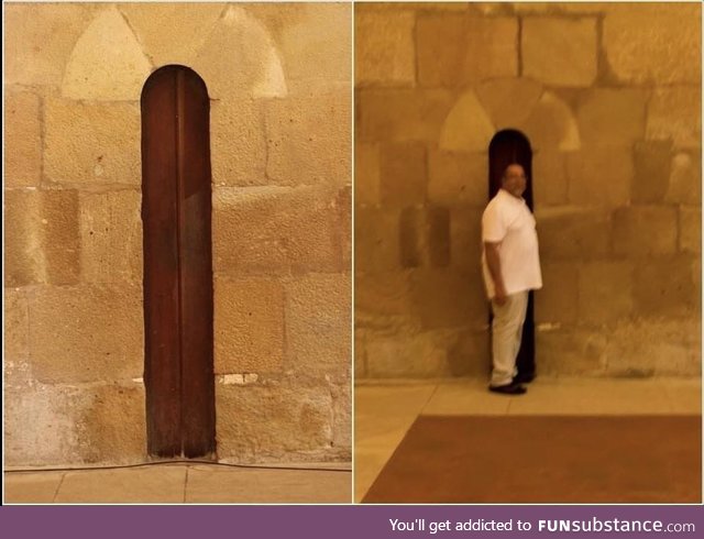 The door to the dining area of the Alcobaça Monastery in Portugal was made narrow so