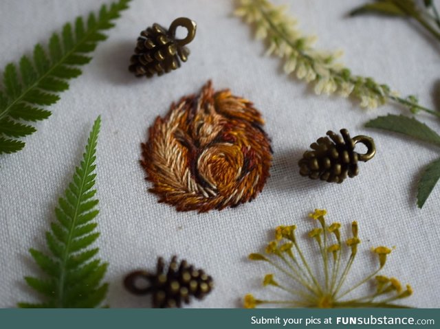 Sleeping hand embroidered squirrel