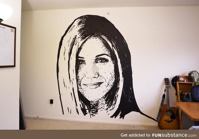 I made Jennifer Aniston out of painter's tape on my bedroom wall