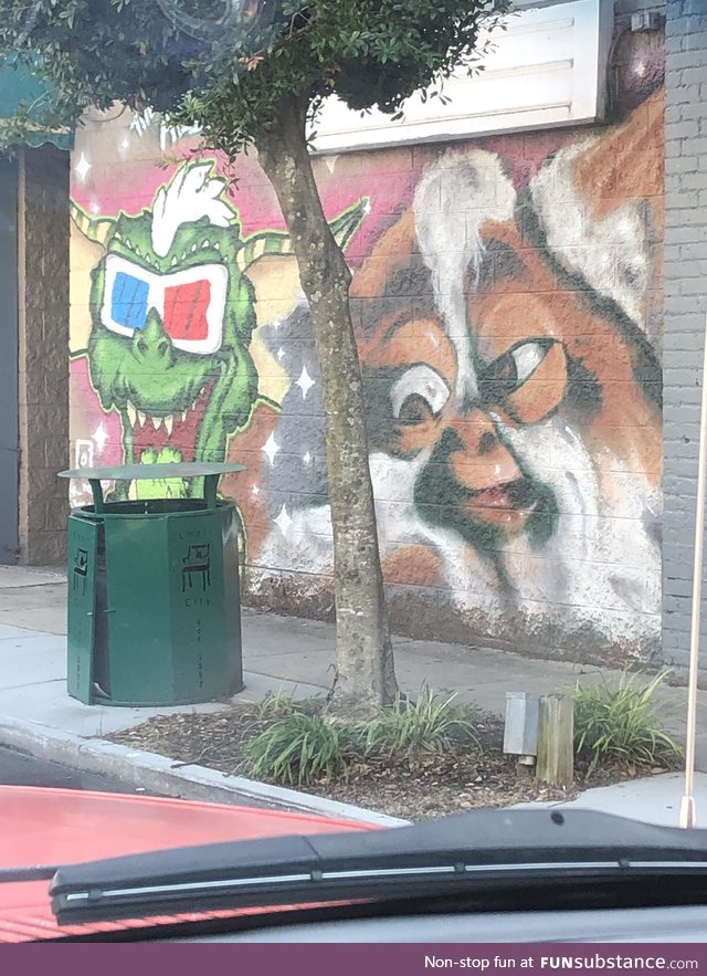 The front of a bar in the middle of downtown