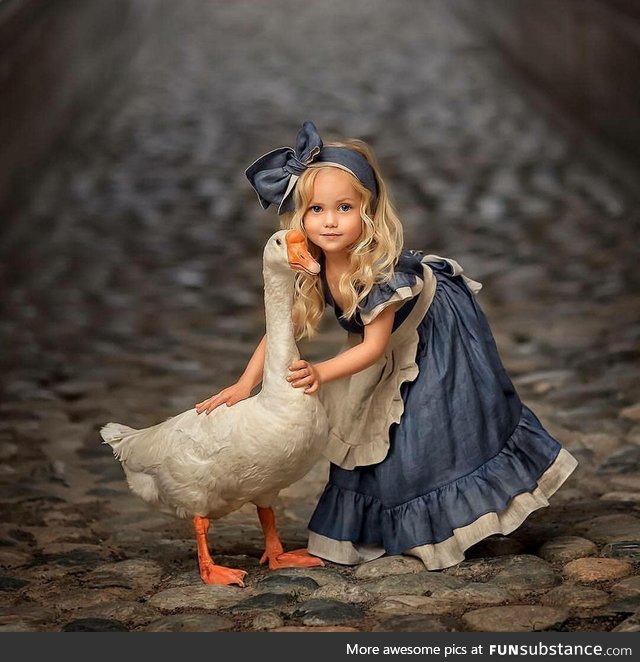 A Girl and a Goose,the eyes are way too soulful..!!