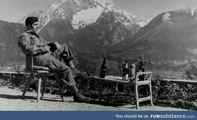 American paratrooper drinks Hitler’s cognac on his patio as the Allies occupy his