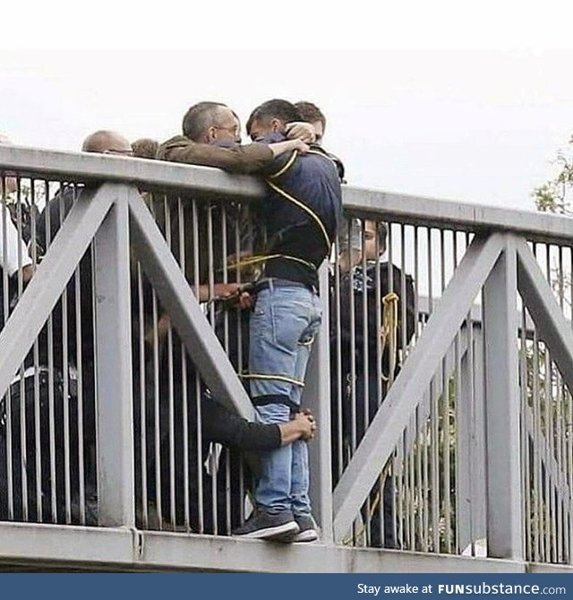 Crowd saves would-be bridge jumper