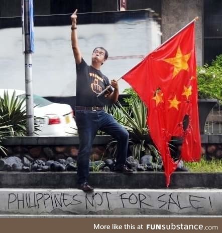 Dude in front of the Chinese embassy