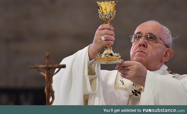 Pope Francis checking if the wine is gay before blessing it