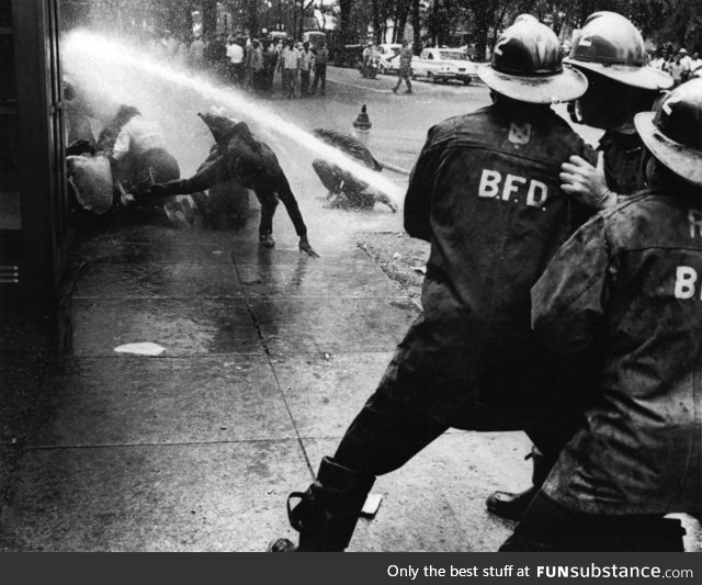 Brave firefighters risking arrest by providing drinking water to voters in long hot