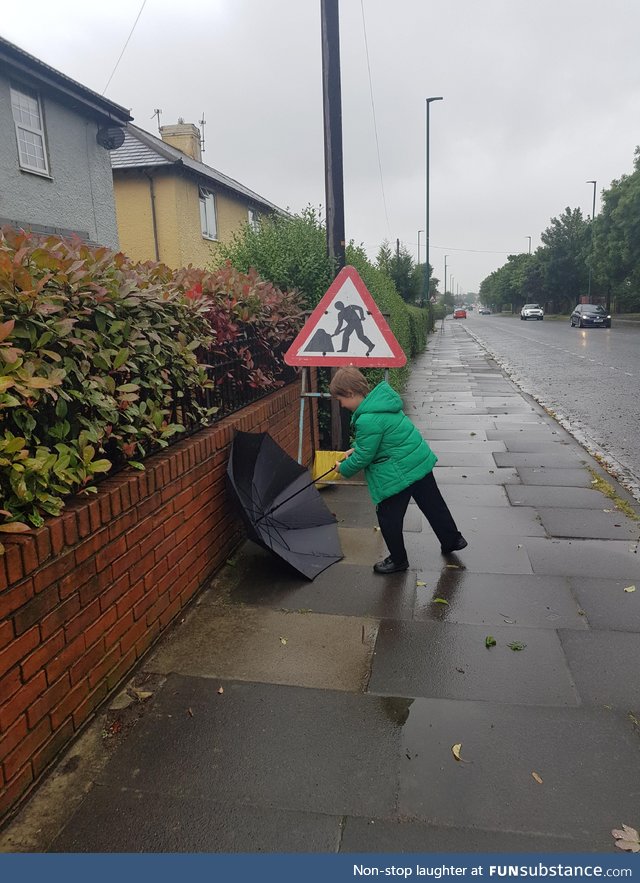 My son doing what the sign says haha