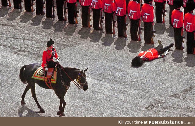 Queen Elizabeth II personally executes a soldier for "not standing precisely in line