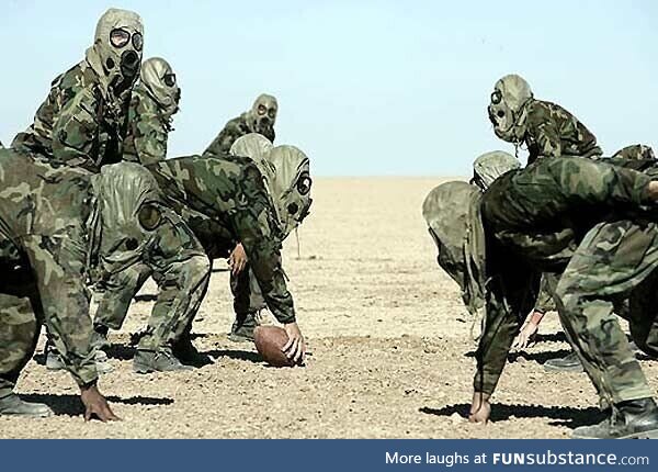 British and German soldiers play football during the Christmas Truce