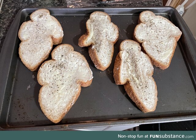 Bread got squished on the way home from the store. Now we are having Garlic Ghosts :)