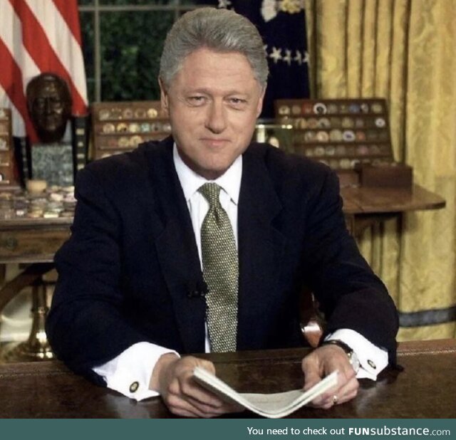 President Bill Clinton and Monica Lewinsky together at his desk in the Oval Office. 1995