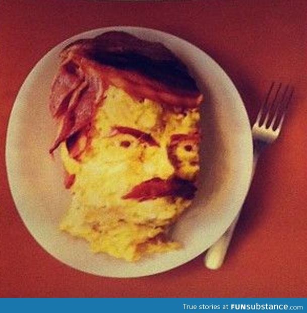 Ron swanson's face made out of bacon and eggs