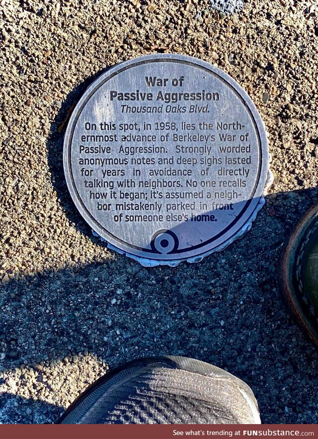 “War of Passive Aggression" Historical plaque attached to sidewalk Berkeley California