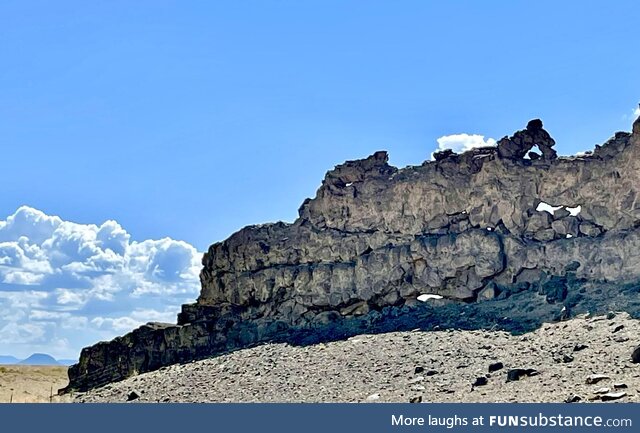 The volcanic wall at Ship Rock, NM looks like a Dragon head. The clouds even looked like