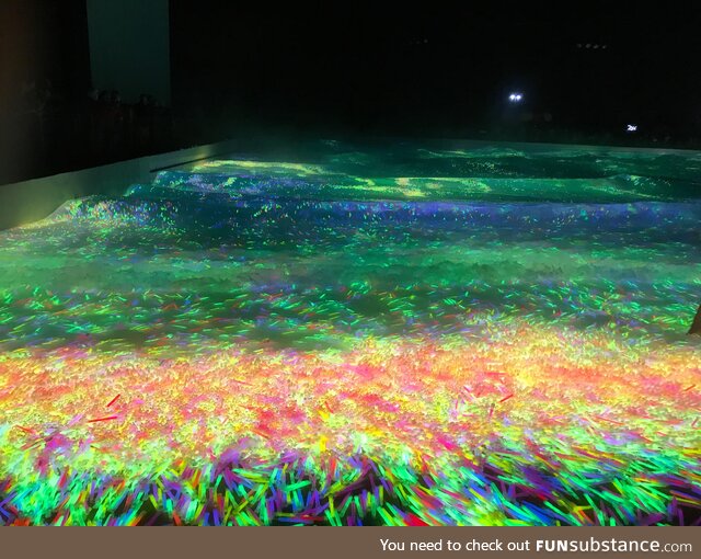 A wave pool full of glow sticks for a Make-a-Wish