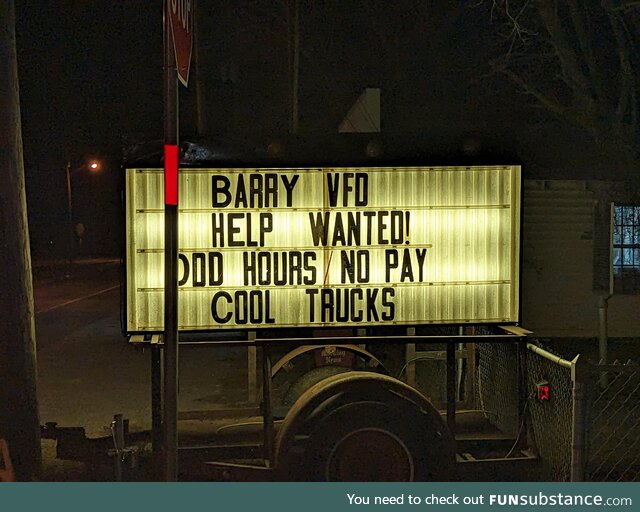 Volunteer firefighter sign in a small town