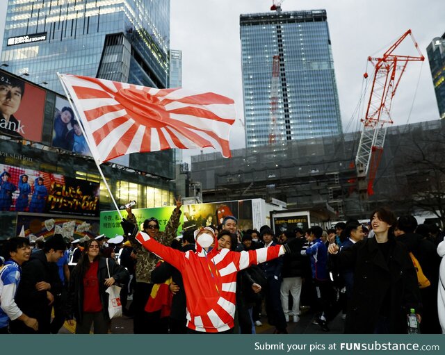 Celebrations in Tokyo after Japan beats Spain in the WC