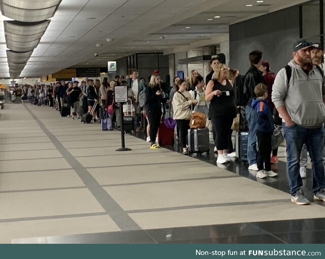 Get to DIA early folks - the general security line is longer than a quarter mile