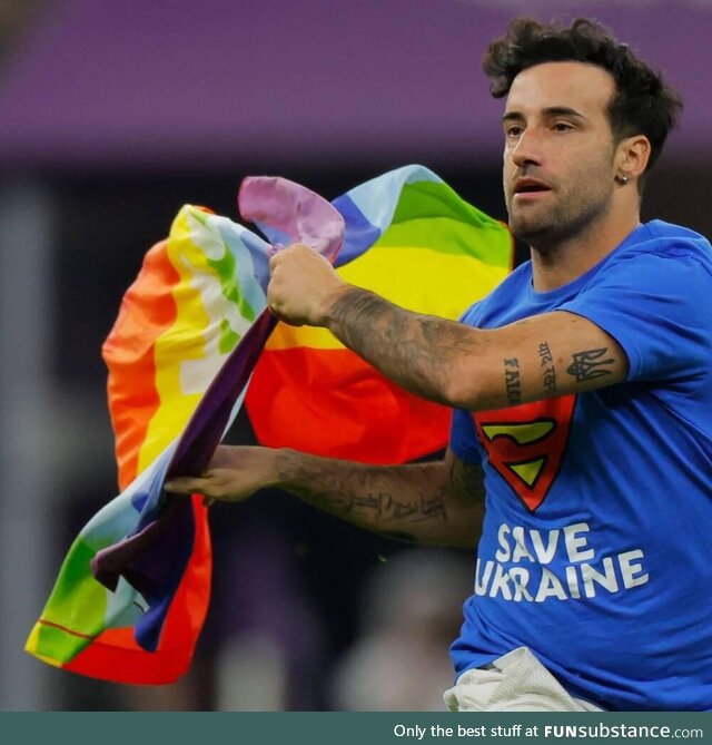 Streaker with rainbow flag during World Cup match