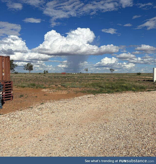 Cloud burst over the desert. Queensland, Australia