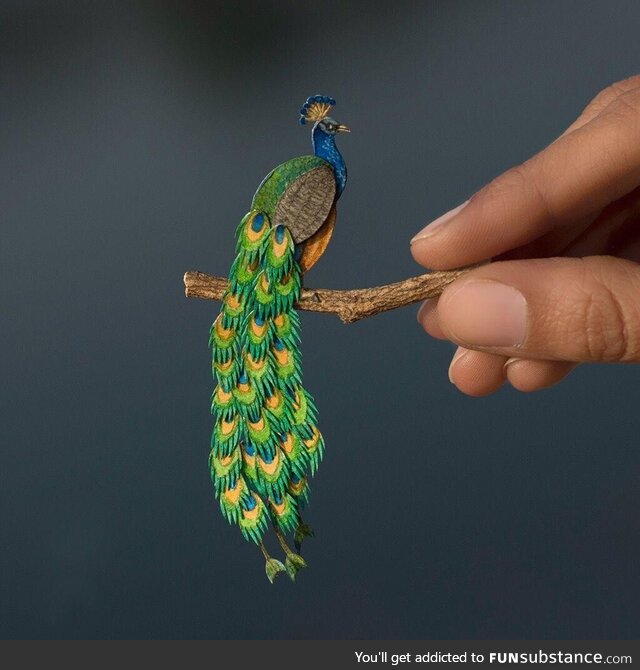 Miniature paper cut artwork of Peacock hand painted with watercolours