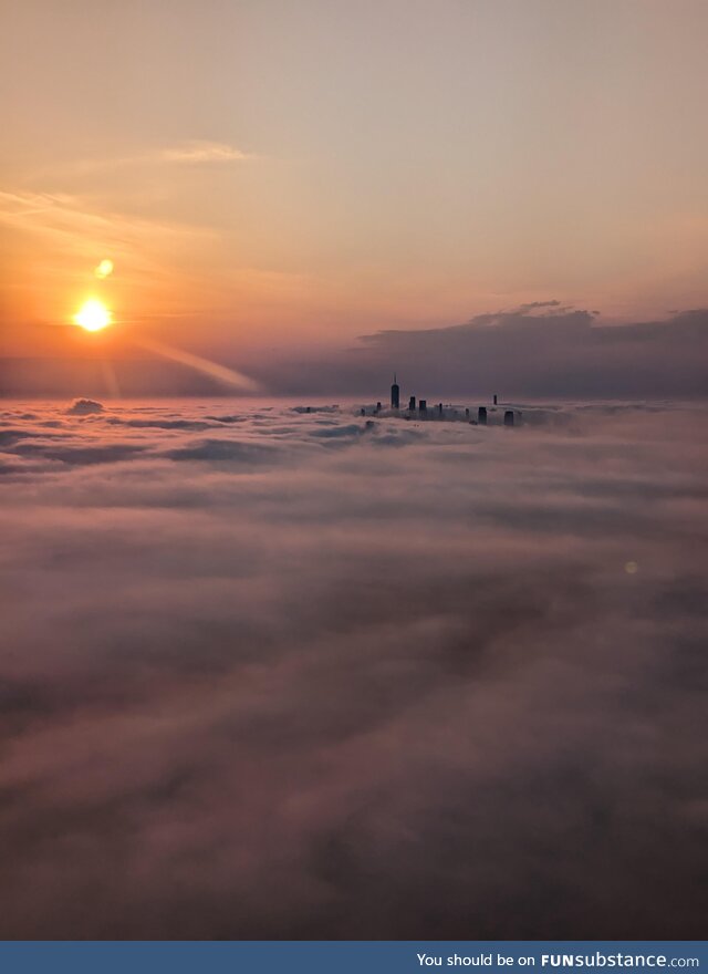 Lower Manhattan swimming in fog this morning