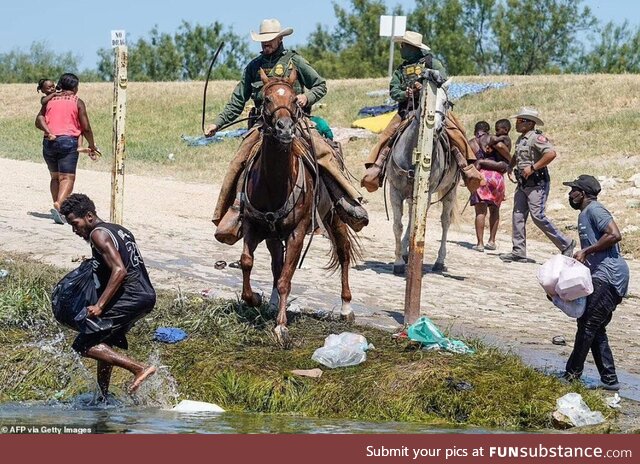 Texas Border Patrol agents rounding up a Haitian refugees